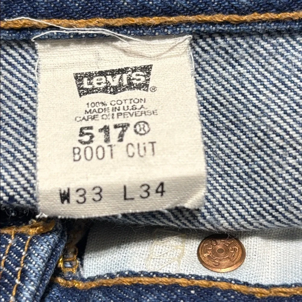 VTG Levi’s 517 Bootcut Jeans Made in USA 33x34 Red Tab Distressed Hem